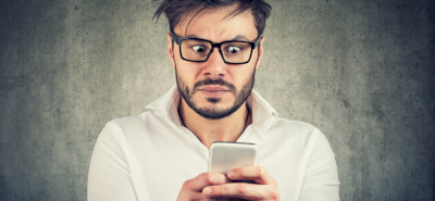 Entrepreneur holding a mobile phone